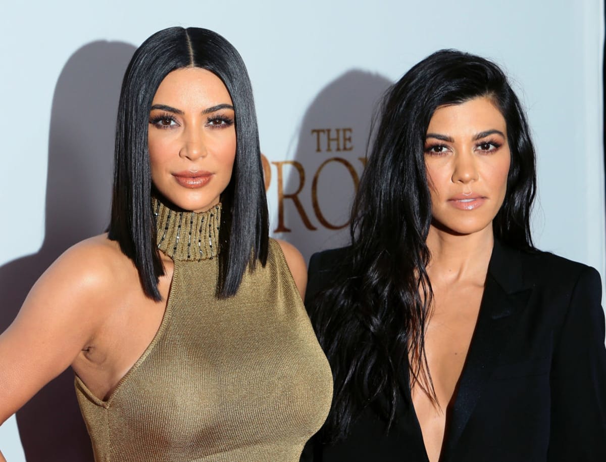 Kim Kardashian West (L) and Kourtney Kardashian (R) | Getty Images | Photo by David Livingston