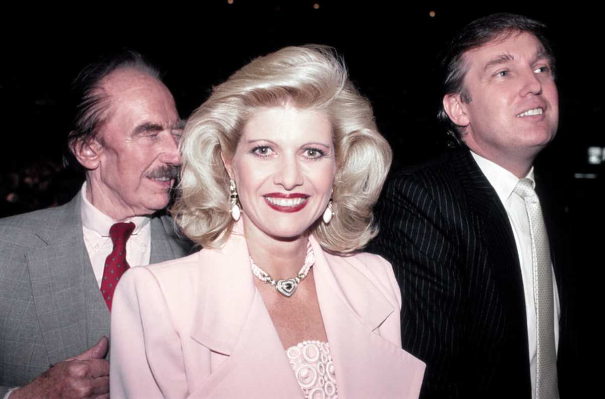 Businessman Donald Trump with father Fred Trump and first wife Ivana ringside at Tyson vs Holmes Convention Hall in Atlantic City, New Jersey January 22, 1988. (Image Source: Jeffrey Asher/ Getty Images)