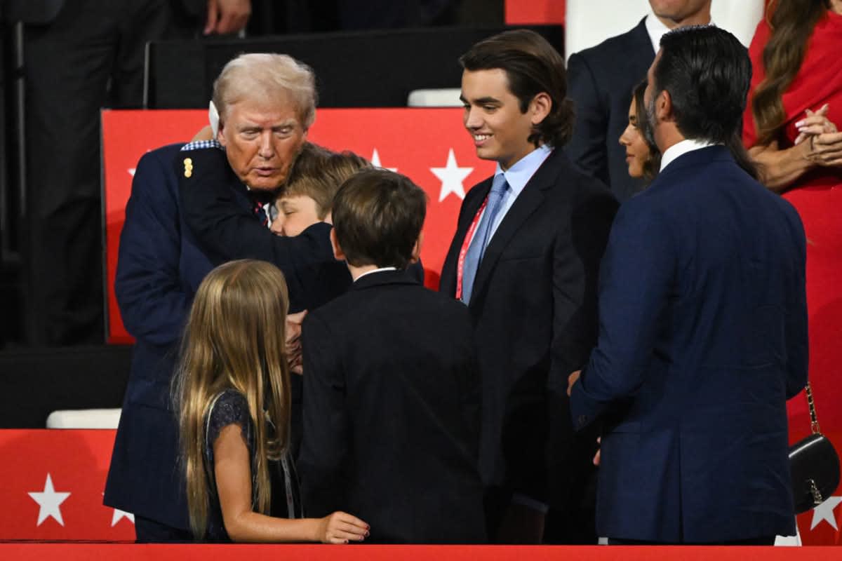 Donald Trump stands with his grandchildren on the third day of the Republican National Convention at the Fiserv Forum on July 17, 2024, in Milwaukee, Wisconsin. (Image Source: Leon Neal/Getty Images)