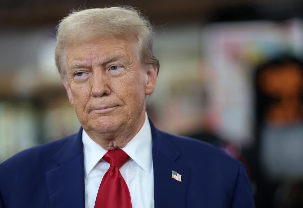 Republican presidential nominee, former U.S. President Donald Trump, looks on as he visits Sprankle's Neighborhood Market on September 23, 2024 in Kittanning, Pennsylvania. (Image Source: Win McNamee/ Getty Images)