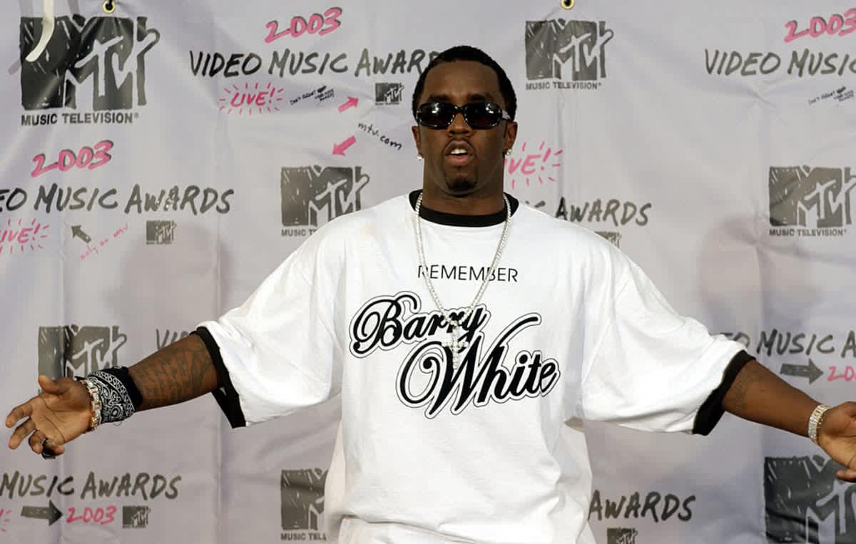 P. Diddy strikes a pose in the press room backstage during the MTV Video Music Awards August 28, 2003. (Cover Image Source: RJ Capak/ Getty Images)