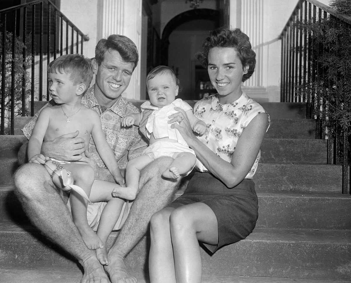 Robert and Ethel Kennedy with their children on steps in 1957. (Image Source: 	Bettmann/Getty Images)