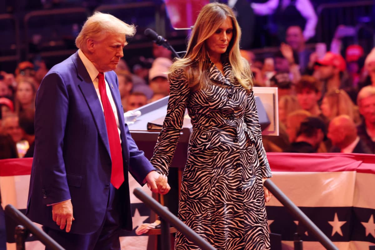 Melania Trump & Donald Trump walk off the stage after a campaign rally at Madison Square Garden on October 27, 2024, in NYC. (Image Source: Getty Images| Photo by Michael M. Santiago)