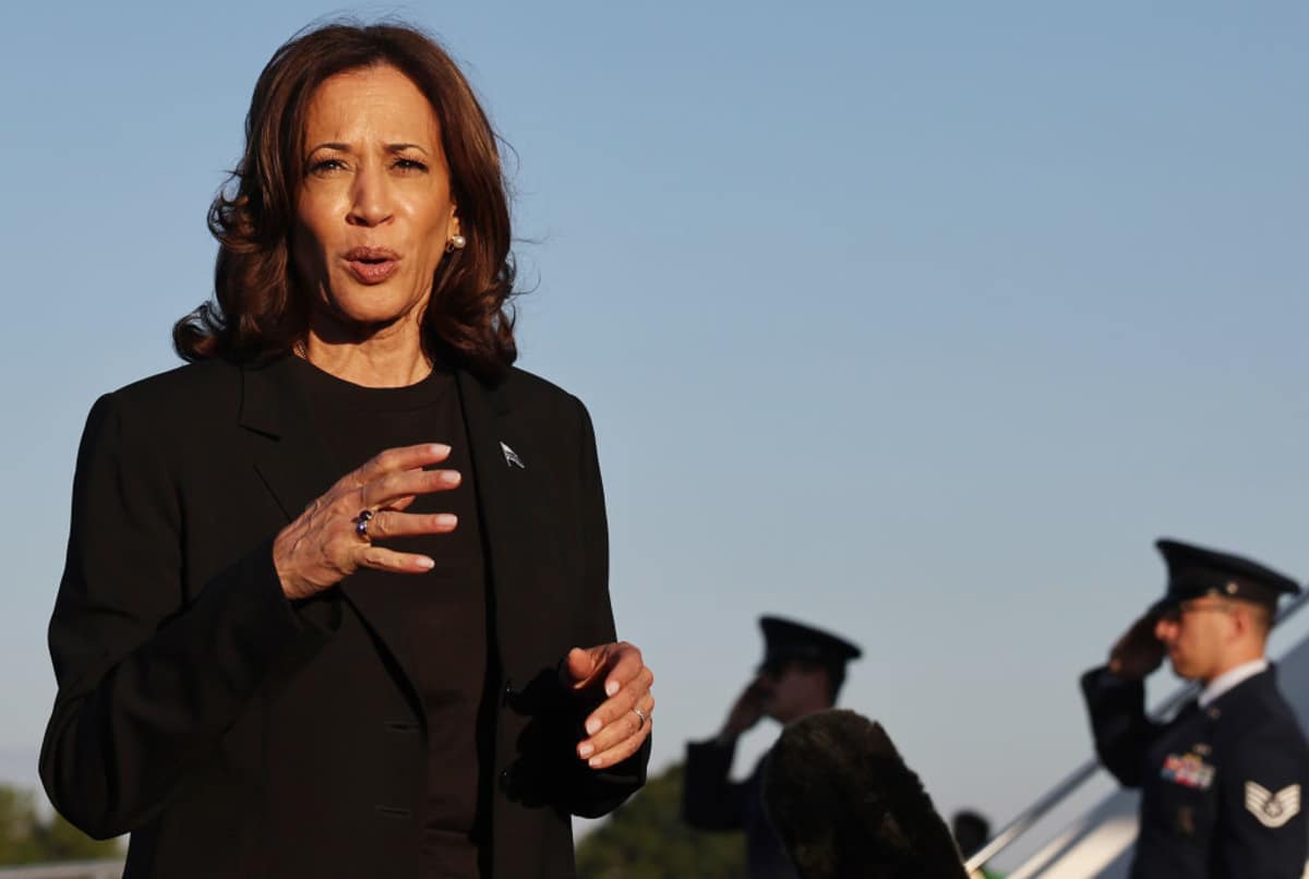 Kamala Harris speaks to the media before boarding Air Force Two after assessing the Hurricane Helene recovery response in North Carolina on October 5, 2024, in Charlotte, North Carolina. (Cover Image Source: Getty Images | Photo by Mario Tama)