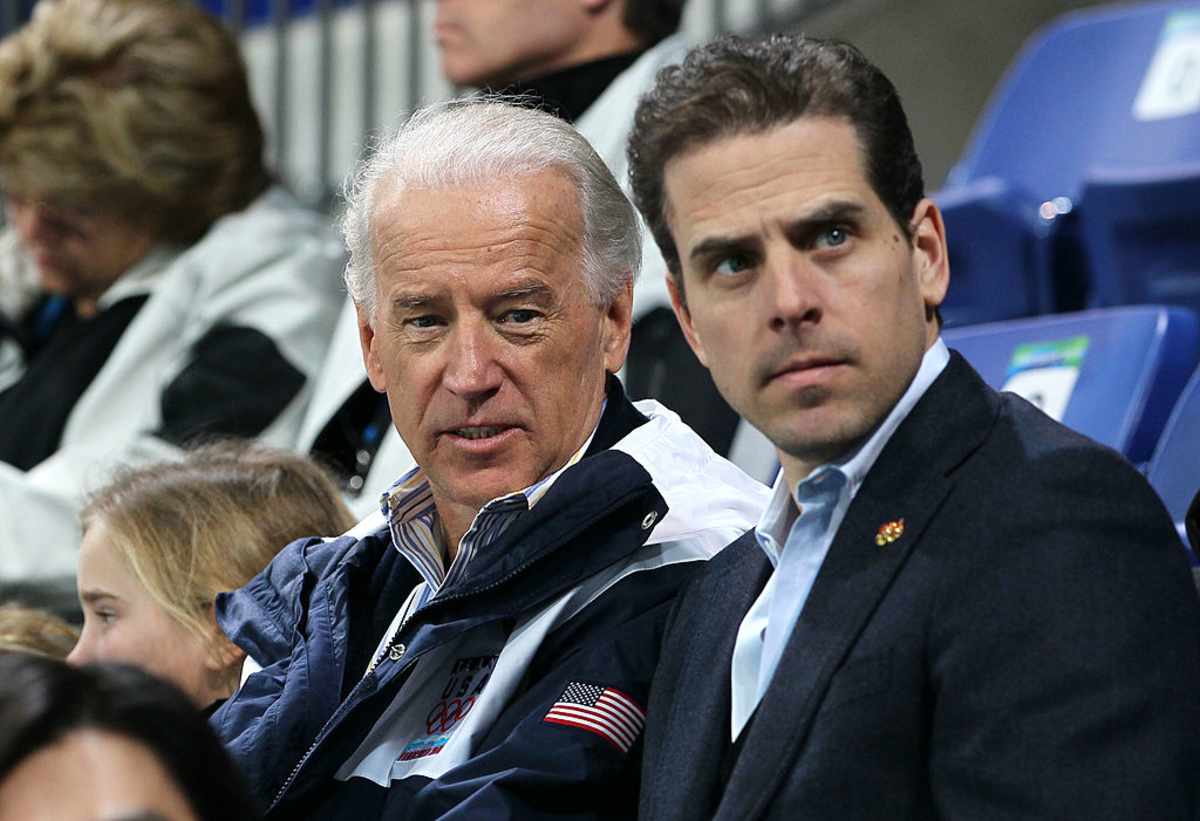 Joe Biden & Hunter Biden at the women's ice hockey game between the United States and China at UBC Thunderbird Arena on February 14, 2010, in Canada. (Image Source: Getty Images| Photo by Bruce Bennett)