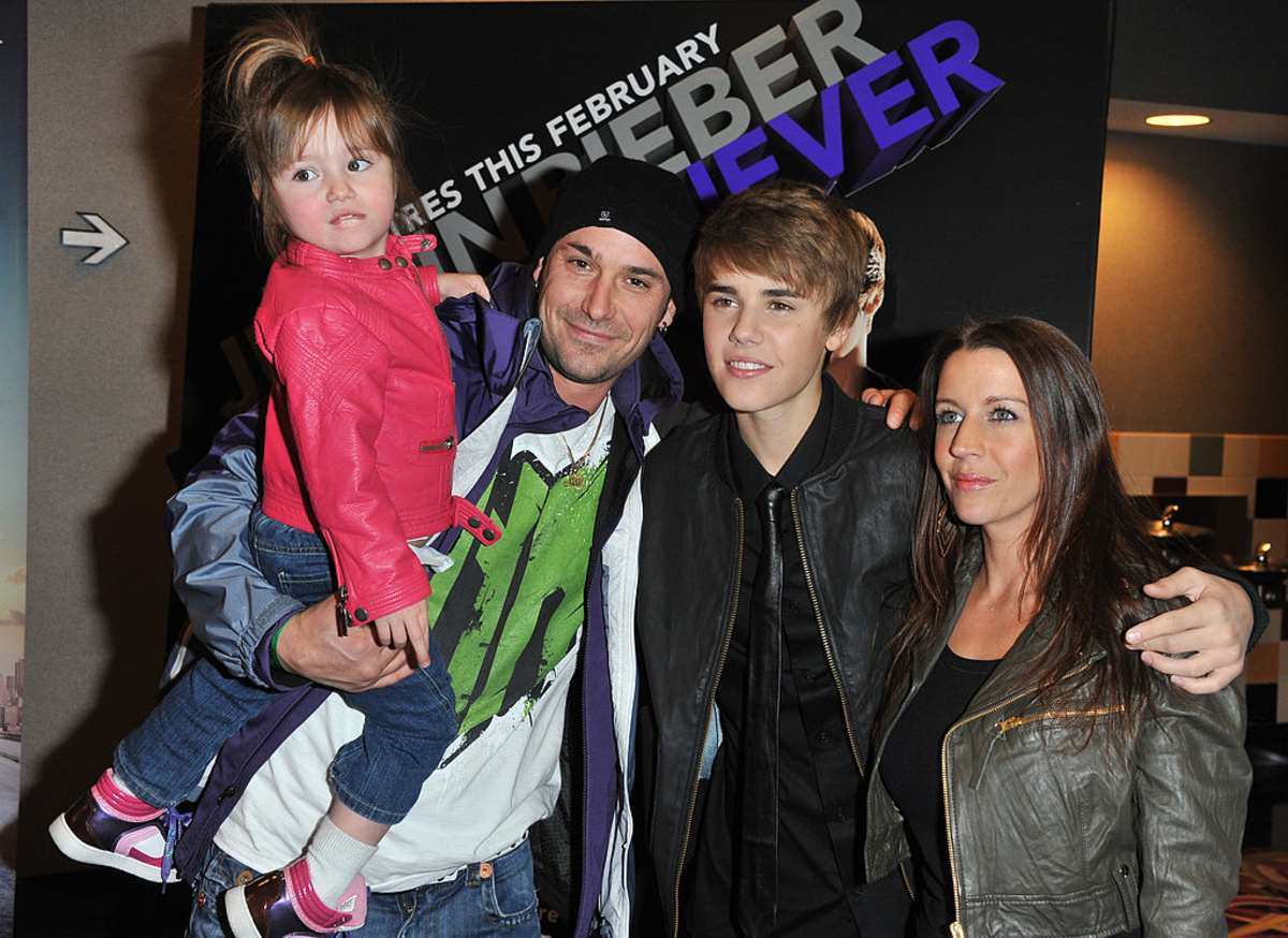 Sister Jazmyn Bieber, father Jeremy Bieber, singer Justin Bieber and mother Pattie Lynn Mallete attend the premiere for 