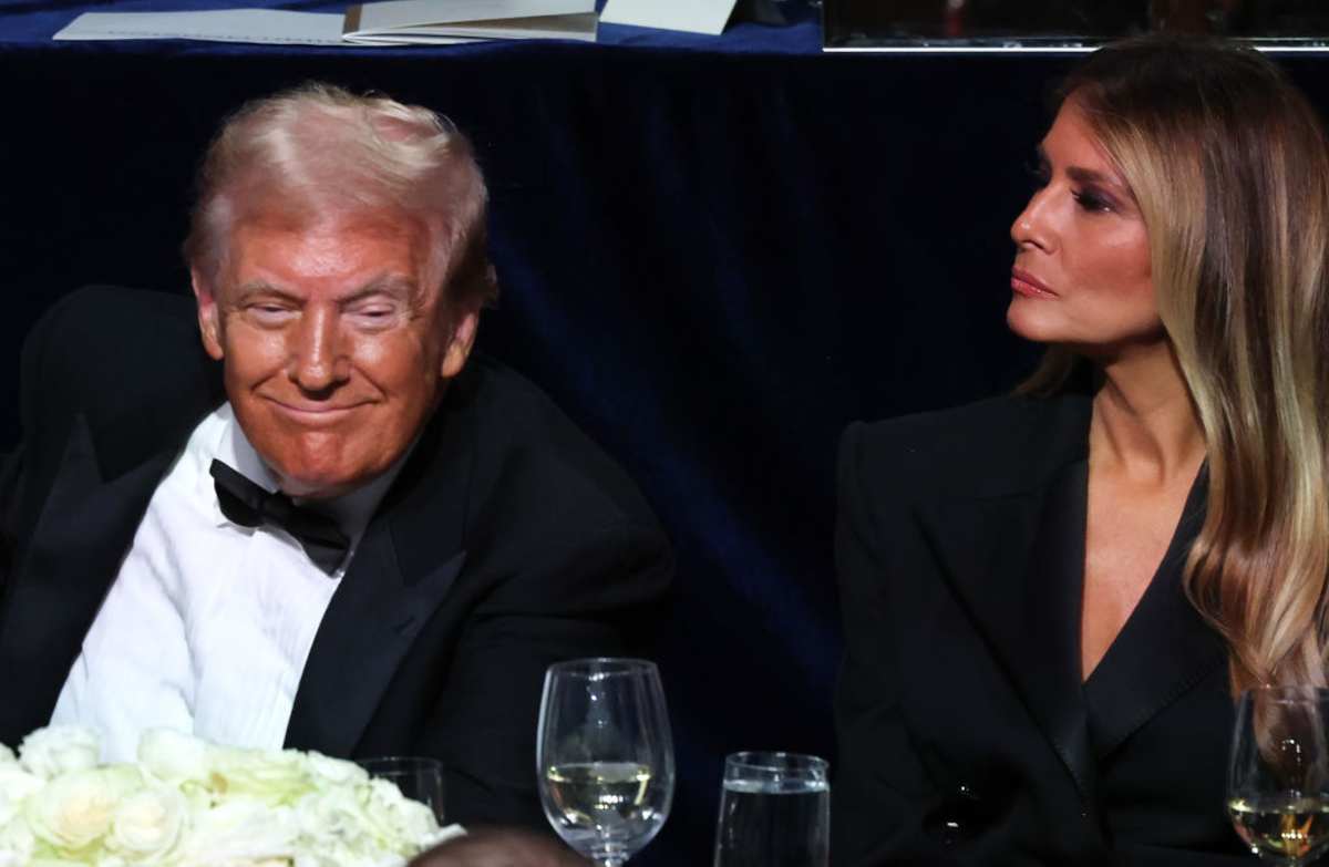 Donald Trump and Melania Trump sit during the annual Alfred E. Smith Foundation Dinner at the New York Hilton Midtown on October 17, 2024 in New York City (Image Source: Getty Images / Photo by Michael M. Santiago)