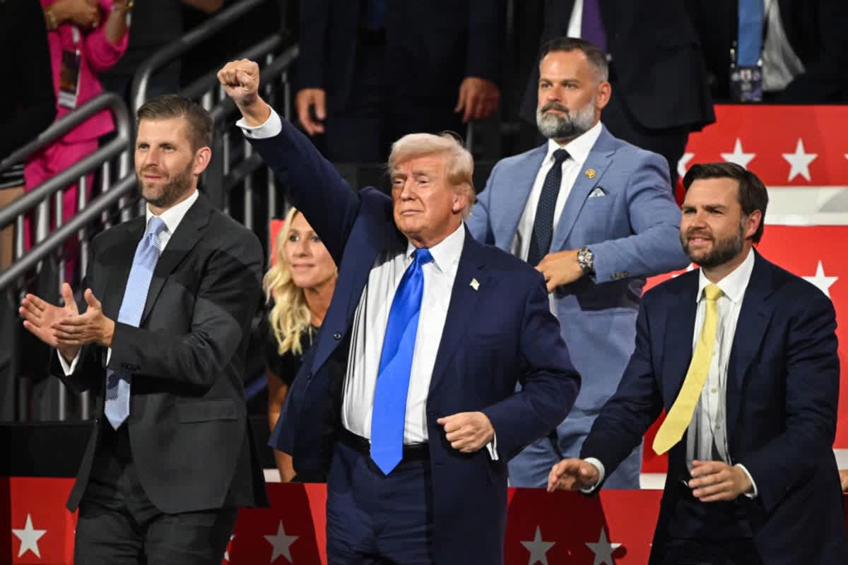 Donald Trump, Eric Trump (L) and J.D. Vance at the Republican National Convention on July 16, 2024 in Wisconsin. (Image Source: Getty Images | Photo by  Leon Neal)