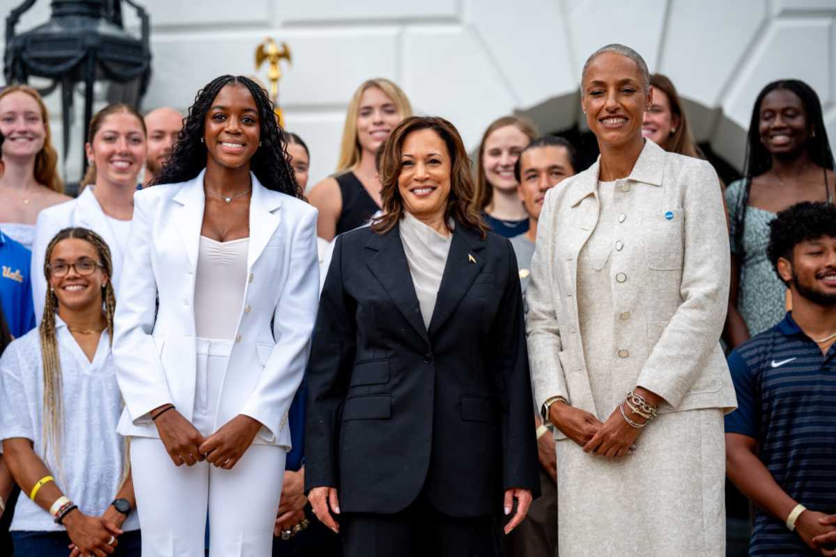 Kamala Harris, and NCAA Senior Vice President of Championships Lynda Tealer,  with players during an NCAA championship teams celebration on the South Lawn of the White House on July 22, 2024, in Washington, DC. U.S. (Image Source: Getty Images| Photo by Andrew Harnik)