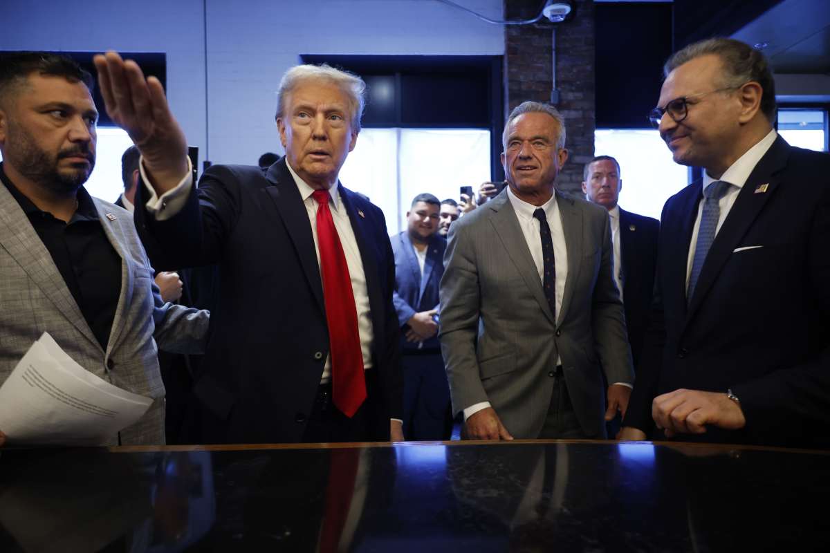 Donald Trump visits The Great Commoner cafe with Robert F. Kennedy Jr. Image Source: Photo by Chip Somodevilla | Getty Images 