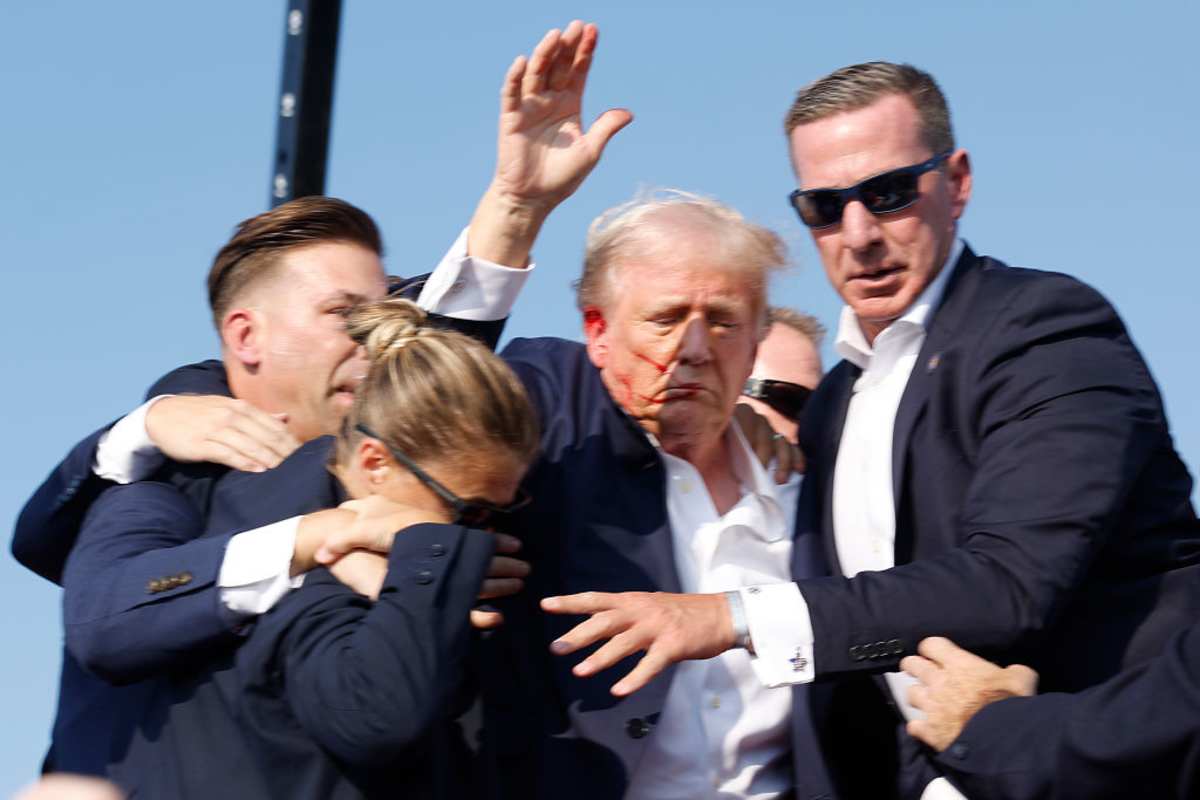 Donald Trump rushed offstage during a rally on July 13, 2024, in Butler, Pennsylvania. (Image Source: Getty Images | Photo By Anna Moneymaker)