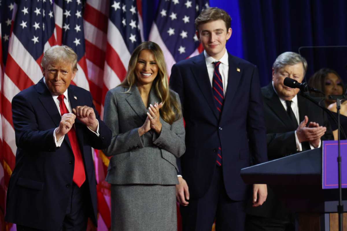 Donald Trump dances on stage with Melania Trump and Barron Trump during an election night event on Nov 06, 2024, in Florida. (Image Source: Getty Images | Photo by  John Moore)