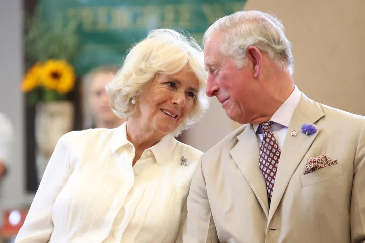 Prince Charles, Prince of Wales and Camilla, Duchess of Cornwall look at eachother as they reopen the newly-renovated Edwardian community hall The Strand Hall during day three of a visit to Wales on July 4, 2018. (Cover Image Source: Getty Images | Photo by Chris Jackson)