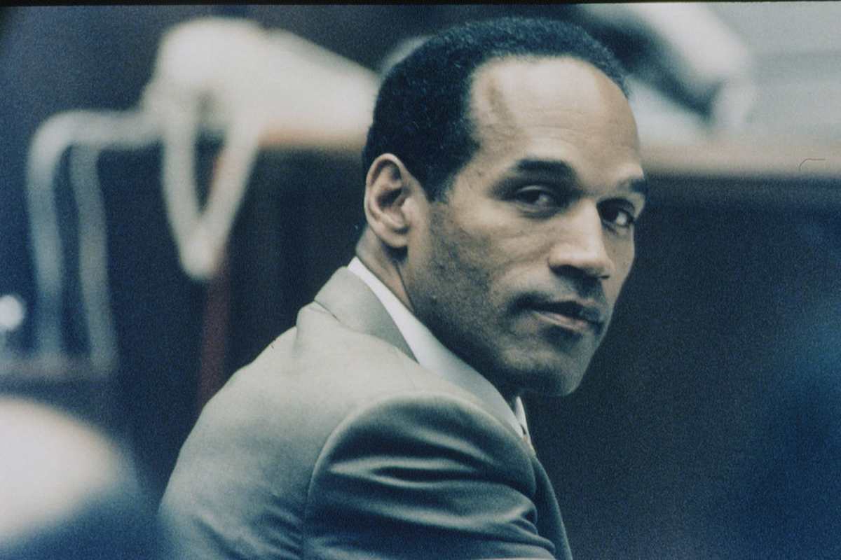 O.J. Simpson during his trial for the murder of his wife Nicole Brown and her friend Ronald Goldman on June 12, 1994.(Image Source: Getty Images| Photo by Bill Nation) 