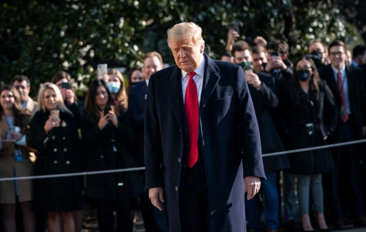 Donald Trump turns to reporters on January 12, 2021, in DC. (Image Source: Getty Images | Photo by Drew Angerer)