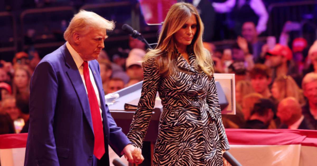 Melania Trump and Donald Trump walk off the stage after a campaign rally at Madison Square Garden on October 27, 2024 in New York City. (Image Source: Getty Images | Photo By Michael M. Santiago)