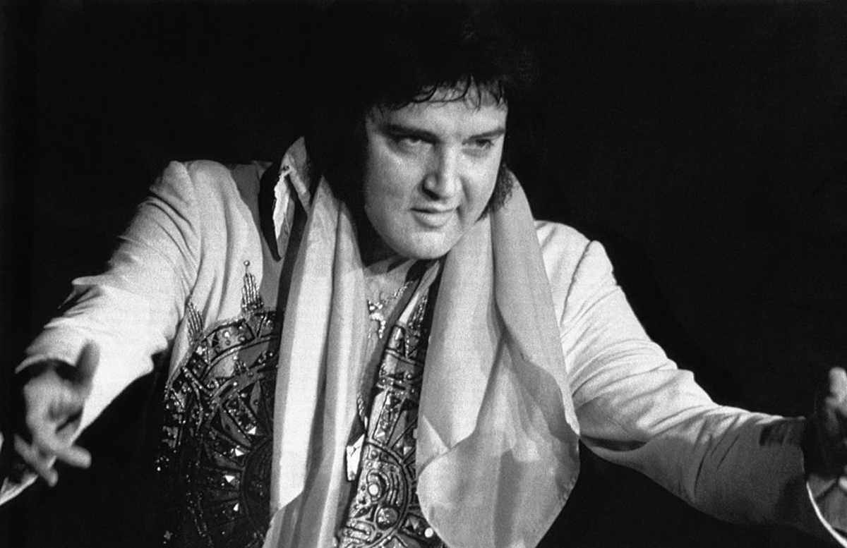 Elvis Presley during 6/20 concert. (Image Source: Photo by Bettmann / Getty Images)