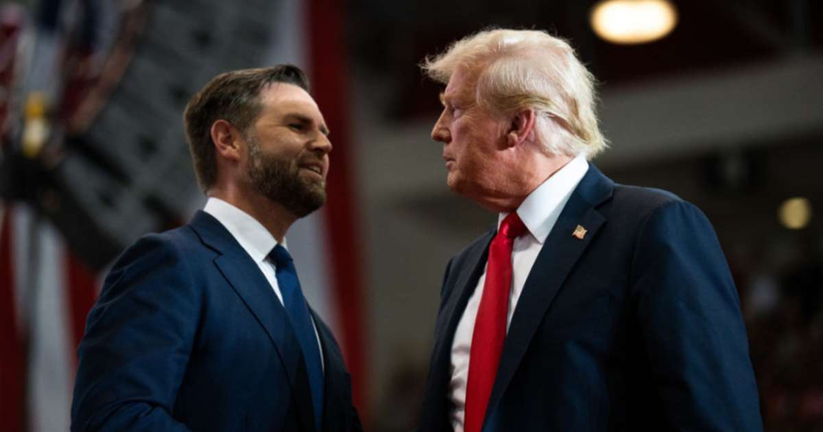 J.D. Vance and Donald Trump during a rally at Herb Brooks National Hockey Center on July 27, 2024, in Minnesota.  (Image Source: Getty Images | Photo By Stephen Maturen)