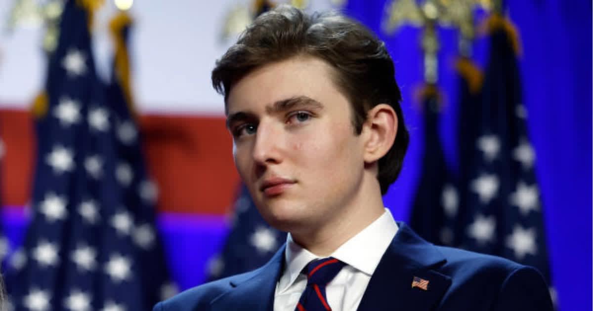 Barron Trump looks on as Donald Trump speaks during an election night event at the Palm Beach Convention Center on November 06, 2024 in West Palm Beach, Florida.(Cover Image Source: Getty Images | Photo by Chip Somodevilla)