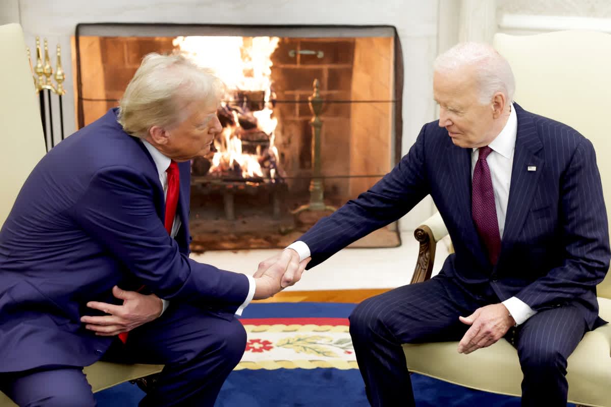 President Joe Biden shakes hands with U.S. President-elect Donald Trump in the Oval Office of the White House. Image Source: Getty Images | Photo by Alex Wong