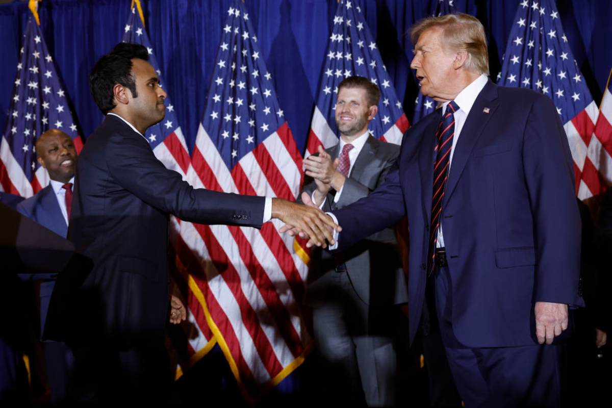 Donald Trump (R) shakes hands with Vivek Ramaswamy during a primary night party at the Sheraton in Nashua, New Hampshire. (Image Source: Photo by Chip Somodevilla/Getty Images)