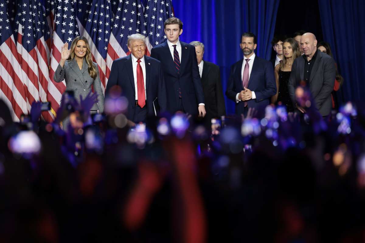 Donald Trump arrives to speak with his family during an election night event at the Palm Beach Convention Center. Image Source: Getty Images | Photo by Win McNamee