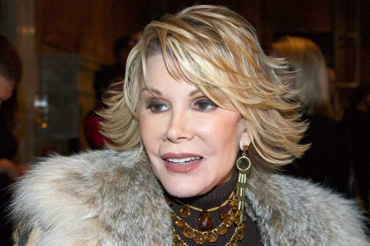 Television personality Joan Rivers arrives for the Banana Republic 2005 Spring Collection at the New York Public Library October 25, 2004 in New York City. (Image Source: Getty Images | Photo by Astrid Stawiarz)