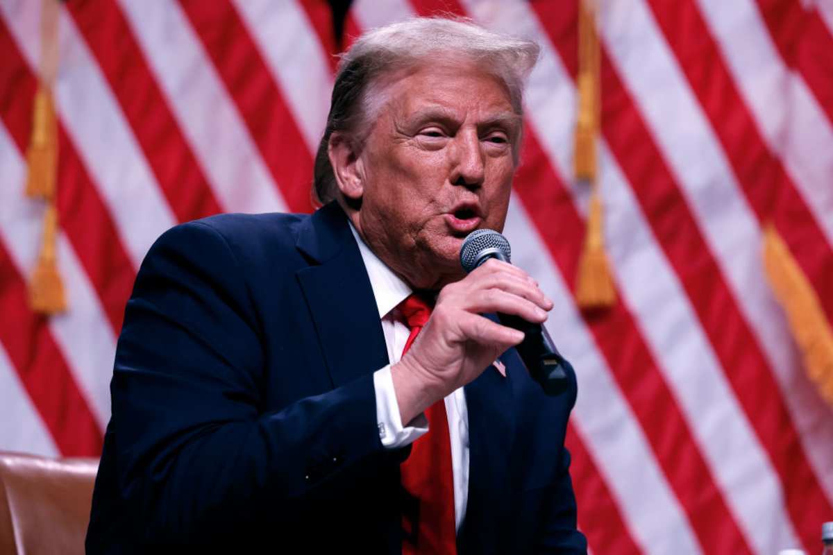 Donald Trump sits down for a conversation with Tucker Carlson during his Live Tour. (Image Source: Getty Images | Photo By Chip Somodevilla)