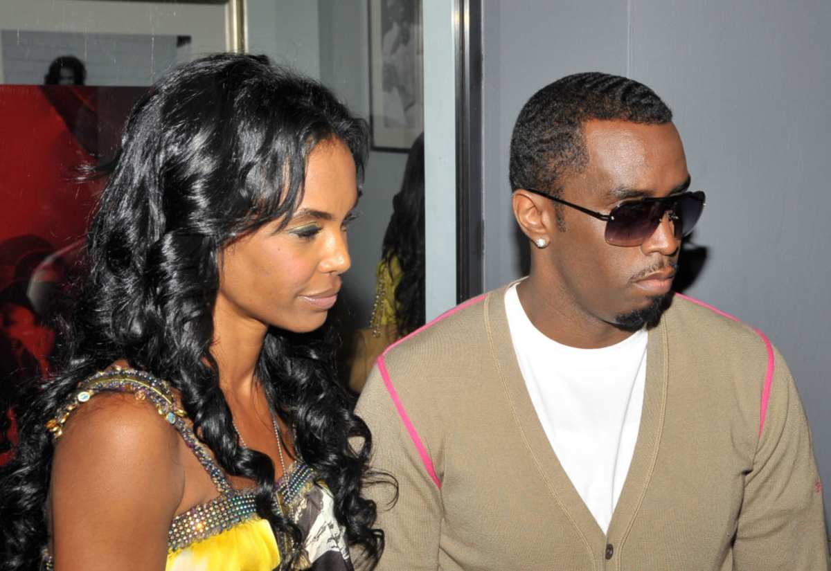 Kim Porter and Diddy at The Celebrity Vault on June 26, 2009, in California. (Image Source: Getty Images | Photo By Dr. Billy Ingram)