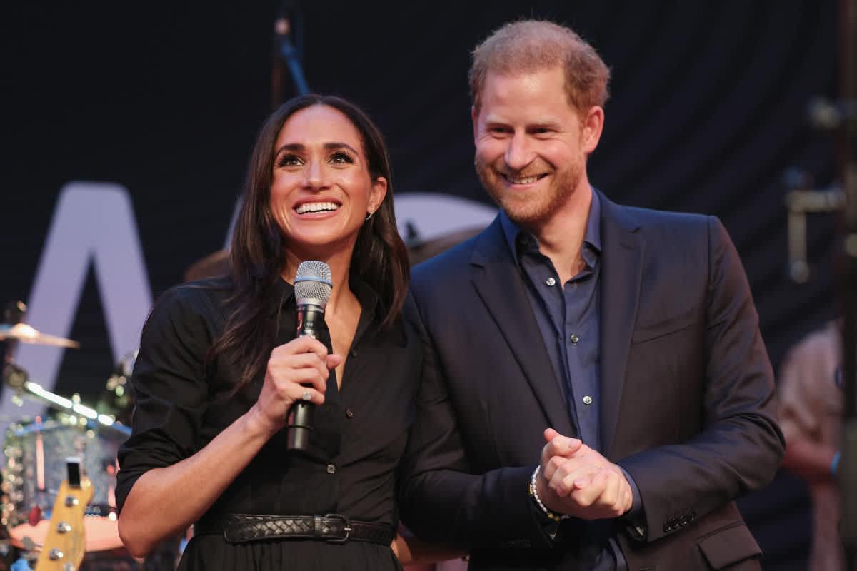 Prince Harry, Duke of Sussex, and Meghan, Duchess of Sussex speak on stage at the 