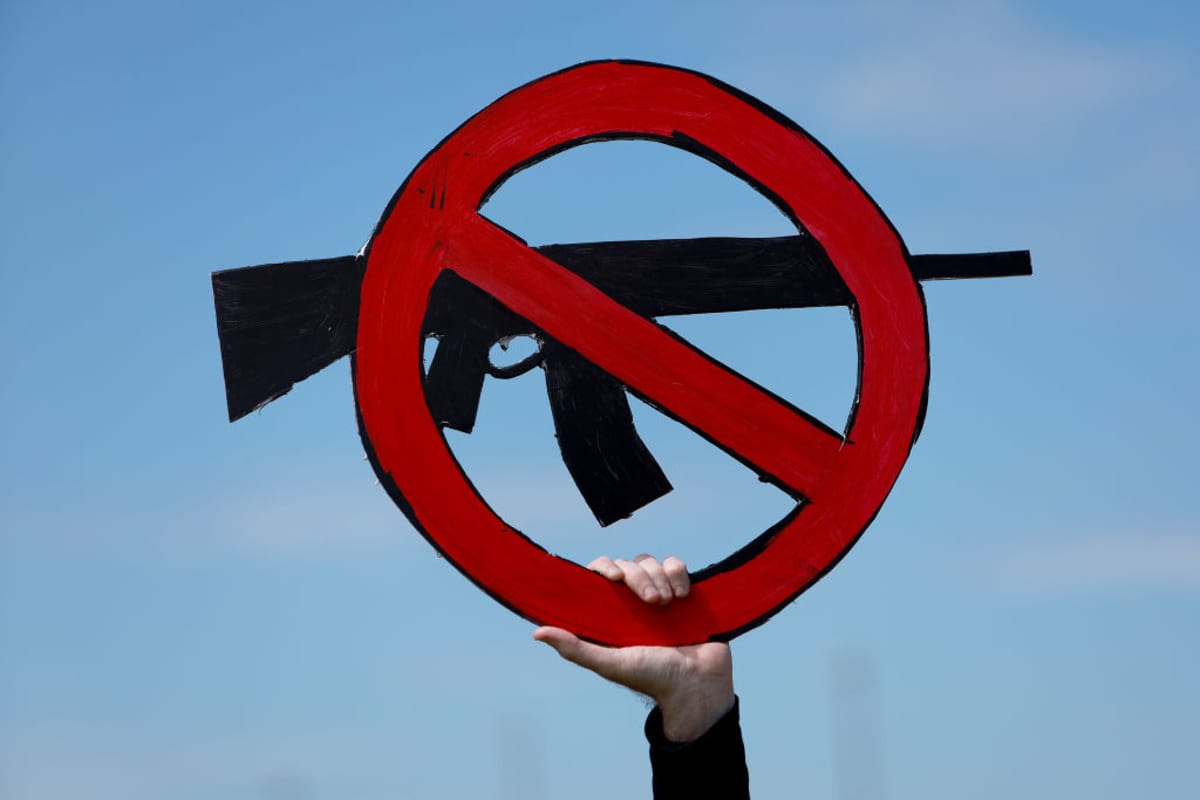 Ed Mackenzie holds a sign during the second March for Our Lives rally on June 11, 2022 in Florida. (Image Source: Getty Images | Photo by Joe Raedle)