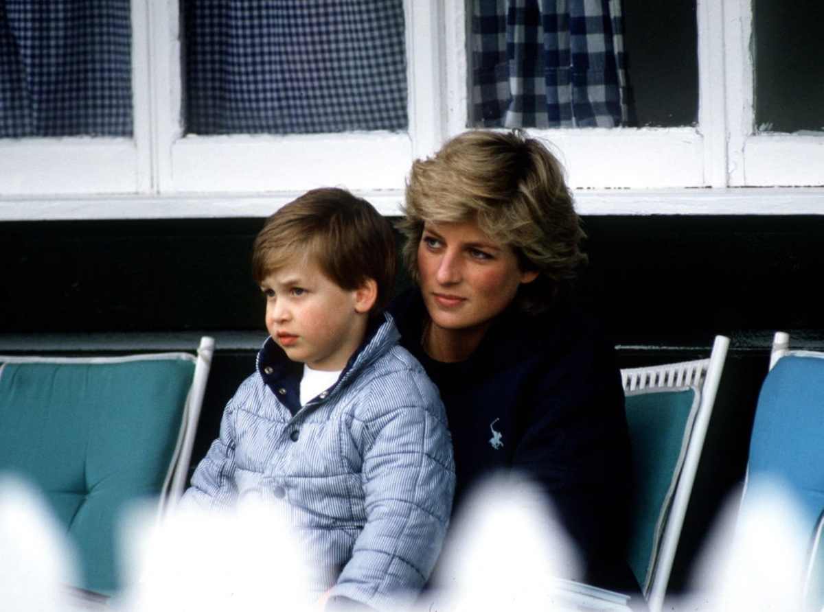 Princess Diana with Prince William sitting on her lap at polo. (Image Source: Tim Graham Photo Library/Getty Images)