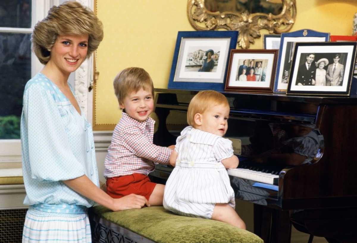 Princess Diana, Prince William, and Prince Harry, at the Kensington Palace (Image Source: Getty Images | Photo By Tim Graham Photo Library)