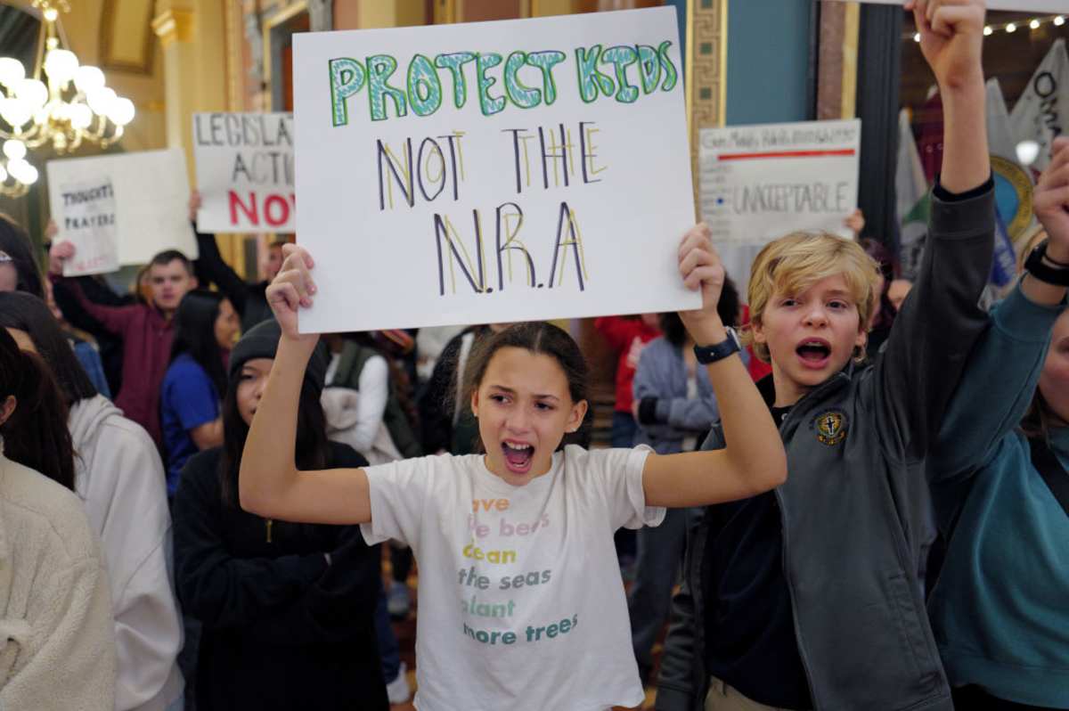 Students demonstrate for stricter gun control legislation as part of a March for Our Lives rally on January 08, 2024, in Iowa. (Image Source: Getty Images | Photo by Scott Olson)