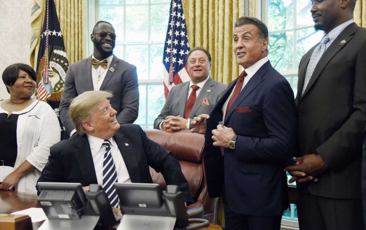 Donald Trump and Sylvester Stallone in the Oval Office of the White House on May 24, 2018. (Image Source: Getty Images | Photo By Olivier Douliery)