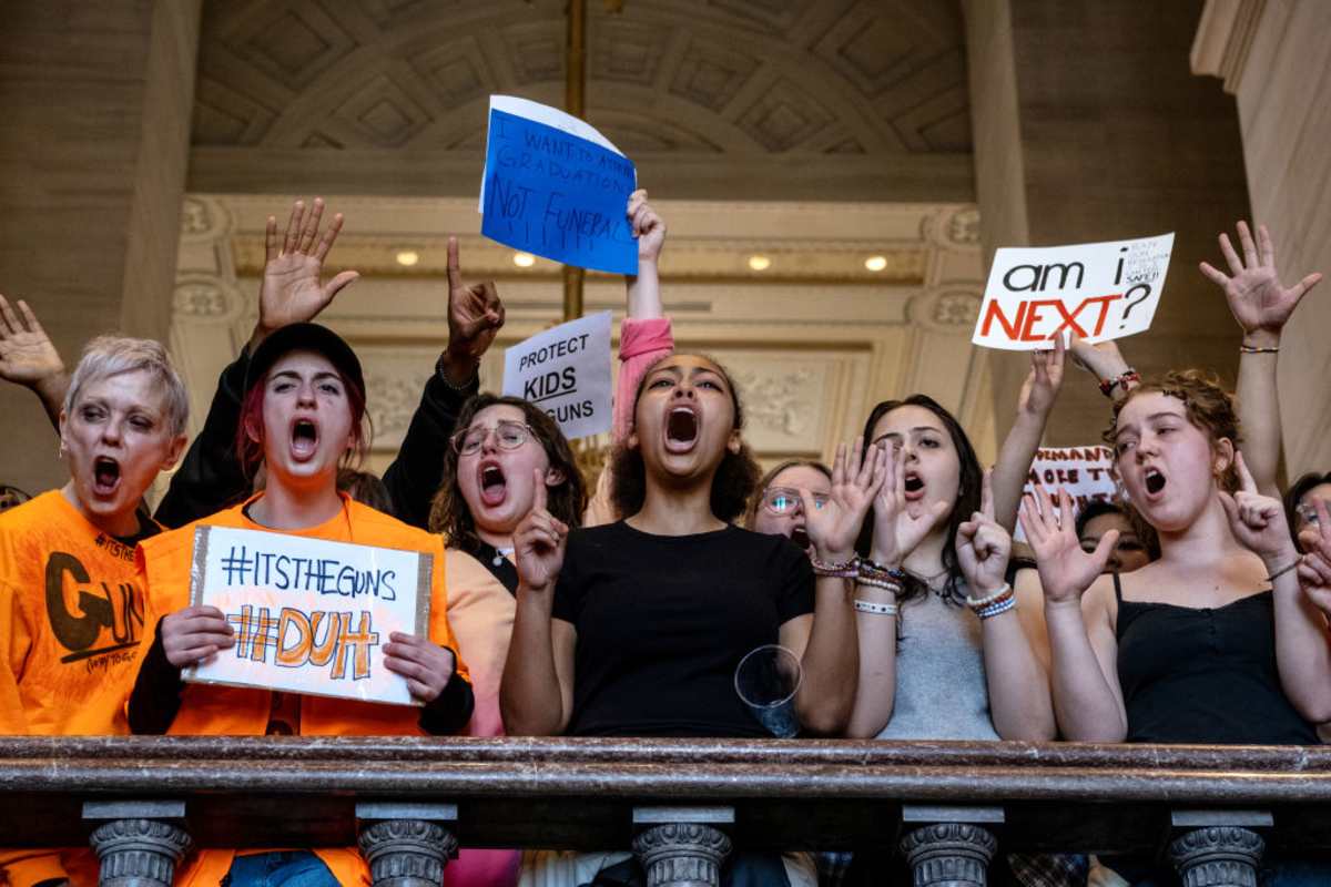 Protesters gather inside the Tennessee State Capitol to call for an end to gun violence and support stronger gun laws on March 30, 2023 in Tennessee. (Image Source: Getty Images | Photo by Seth Herald)