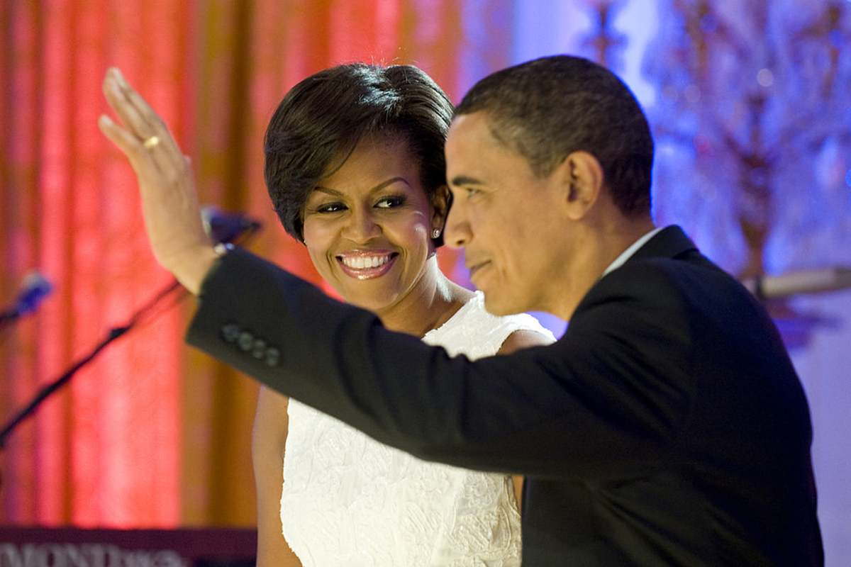 Barack Obama and Michelle Obama at a celebration of country music in the East Room of the White House July 21, 2009 in Washington DC. (Image Source: Getty Images| Photo by Matthew Cavanaugh-Pool) 