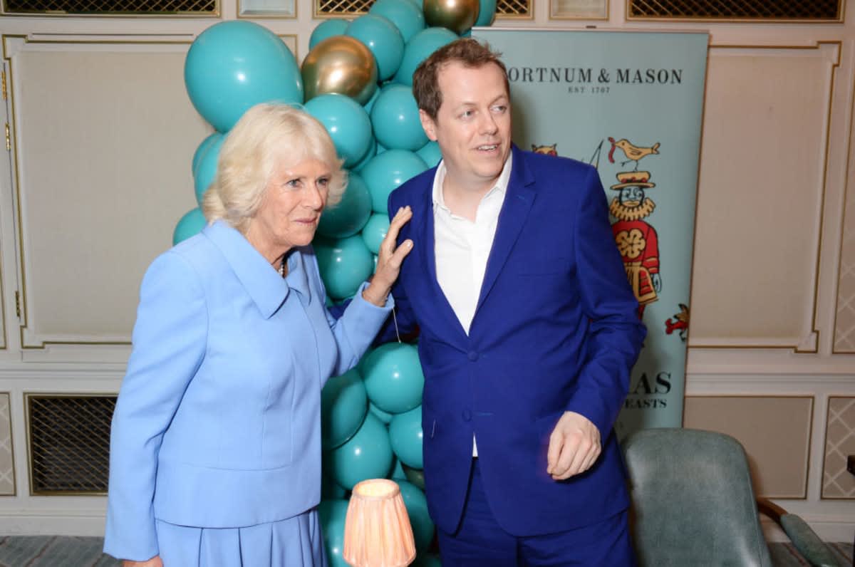 Queen Camilla and Tom Parker Bowles at the launch of a cookbook on October 17, 2018. (Image Source: Getty Images | Photo By David M. Benett)