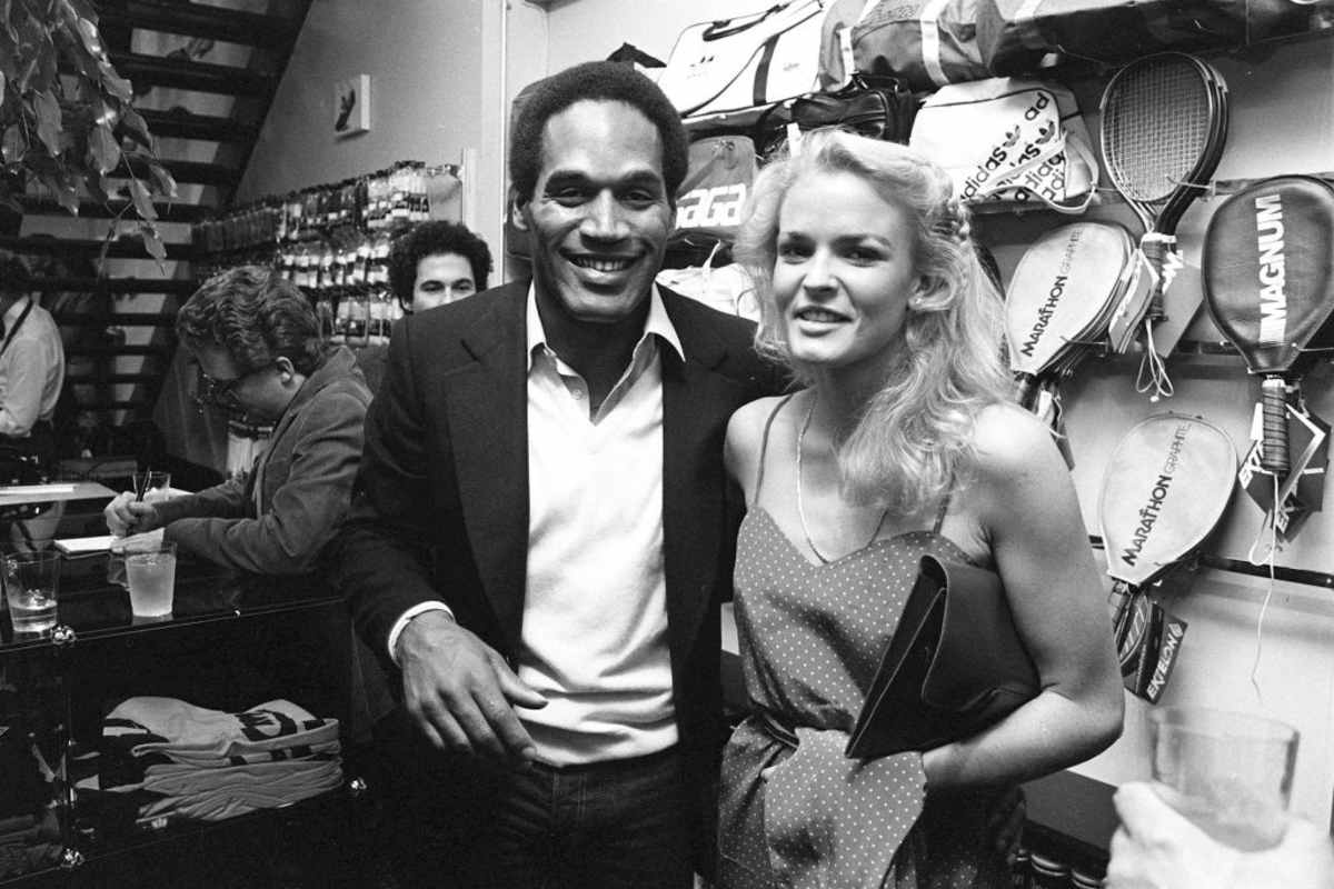 OJ Simpson & Nicole Brown at sports store January 1980 in LA. (Image Source: Getty Images| Photo by Paul Harris) 