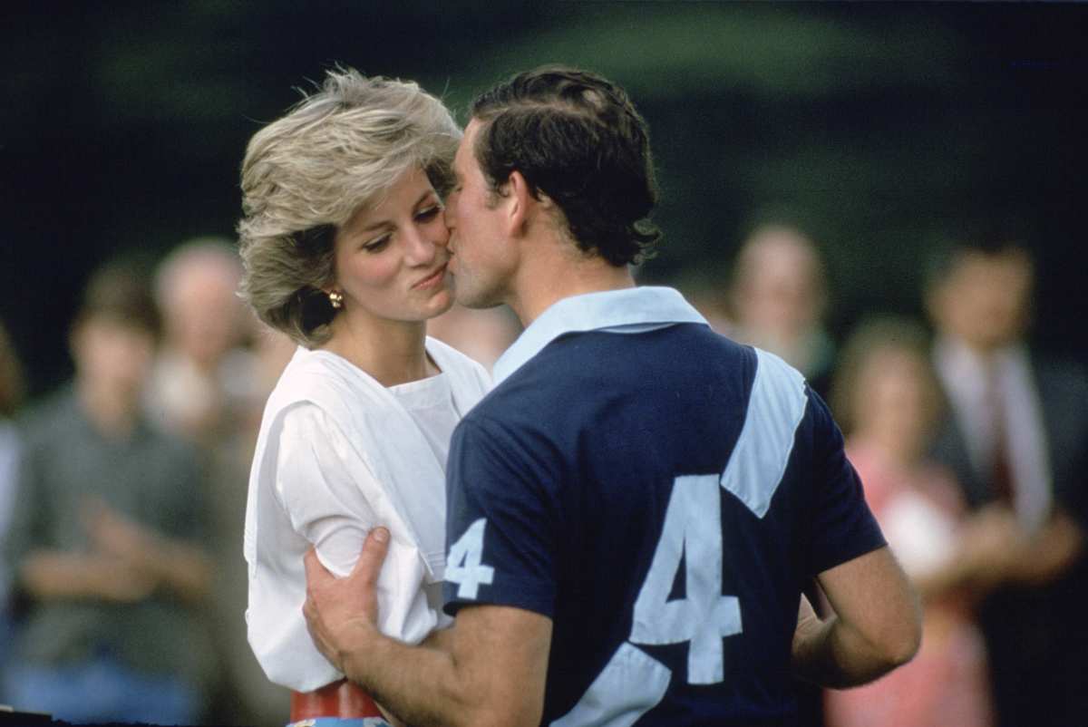 Prince Charles,The Prince of Wales kissing Princess Diana at prizegiving after a polo match at Cirencester. (Image Source): Getty Images | Photo by Tim Graham