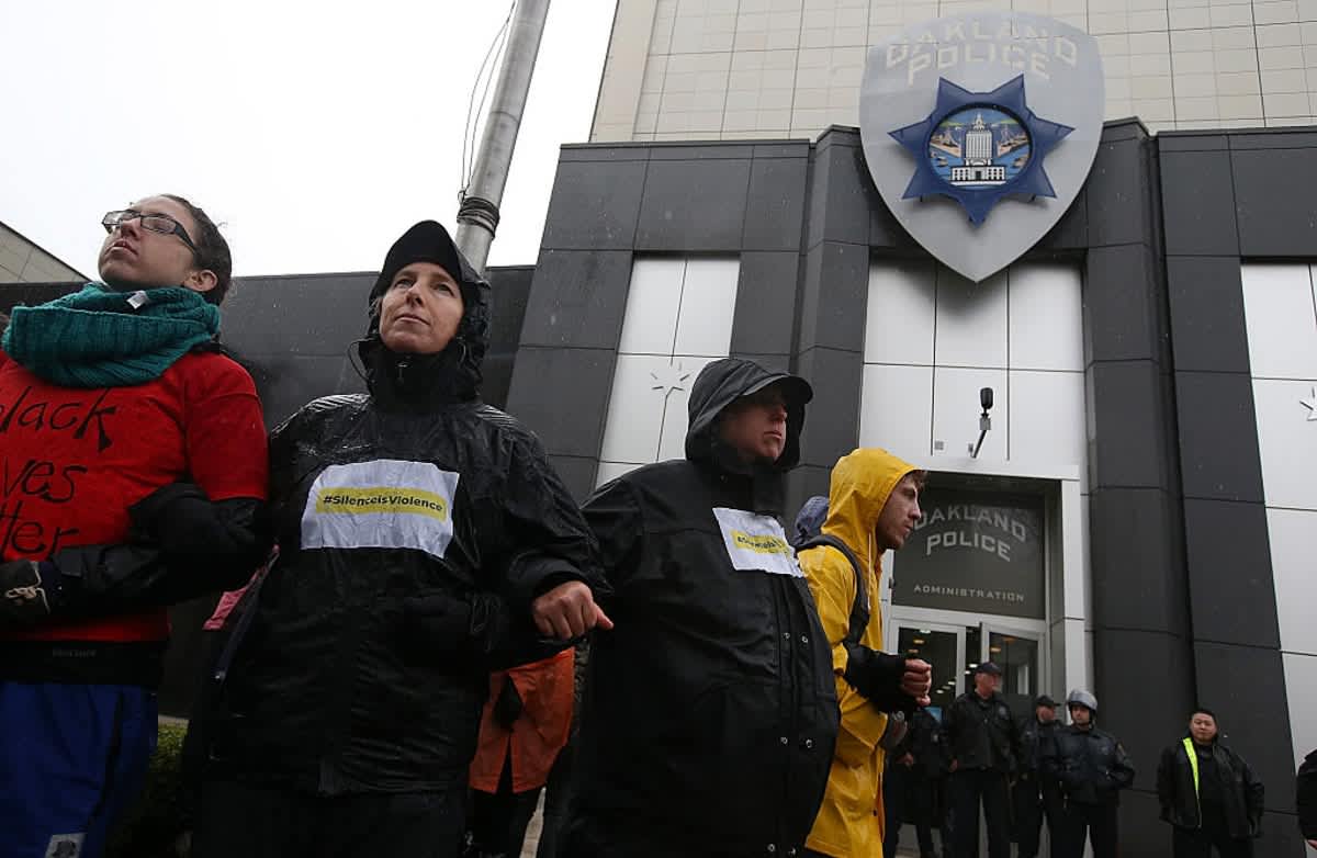 Protestors on December 15, 2014 in Oakland, California. (Image Source: Photo by Justin Sullivan/Getty Images)