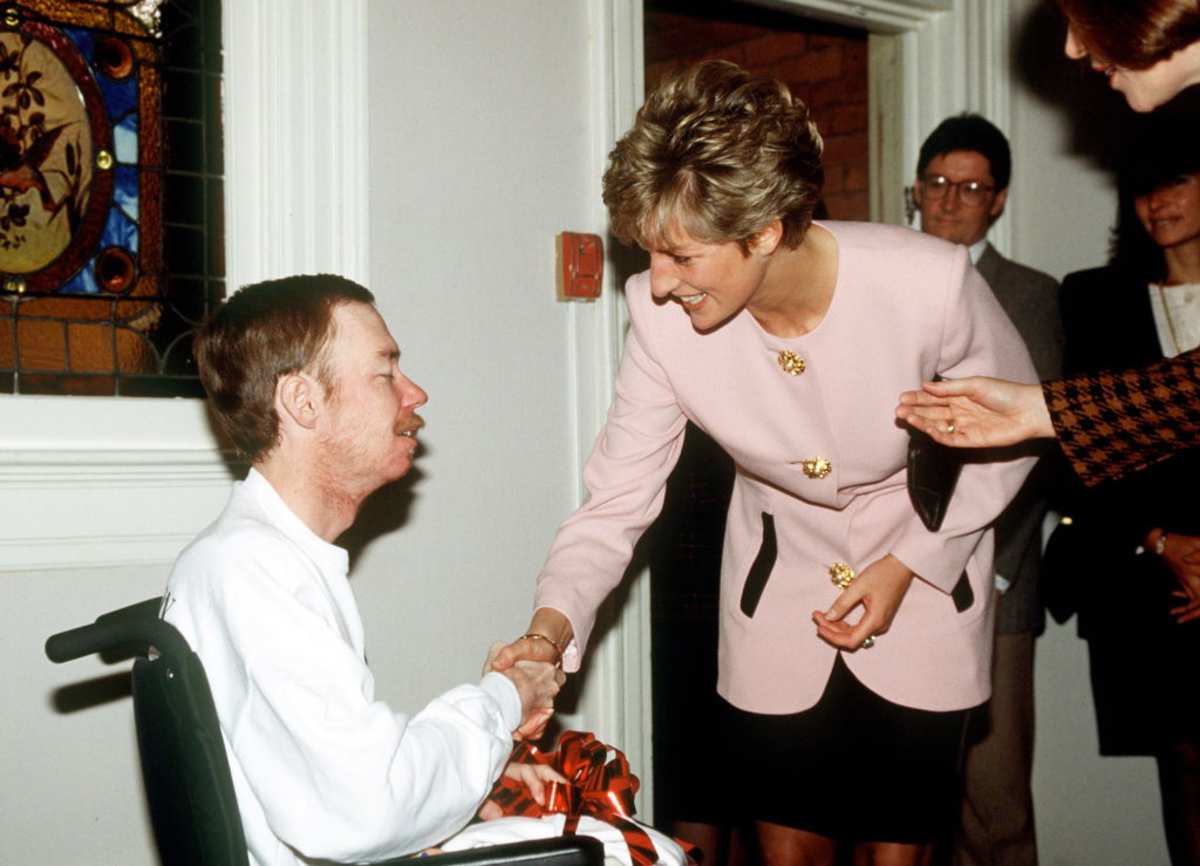 Princess Diana Shaking Hands With One Of The Residents Of Casey House, An Aids Hospice, In Toronto, Canada 1991. (Image Source: Getty Images| Photo by Tim Graham Photo Library) 