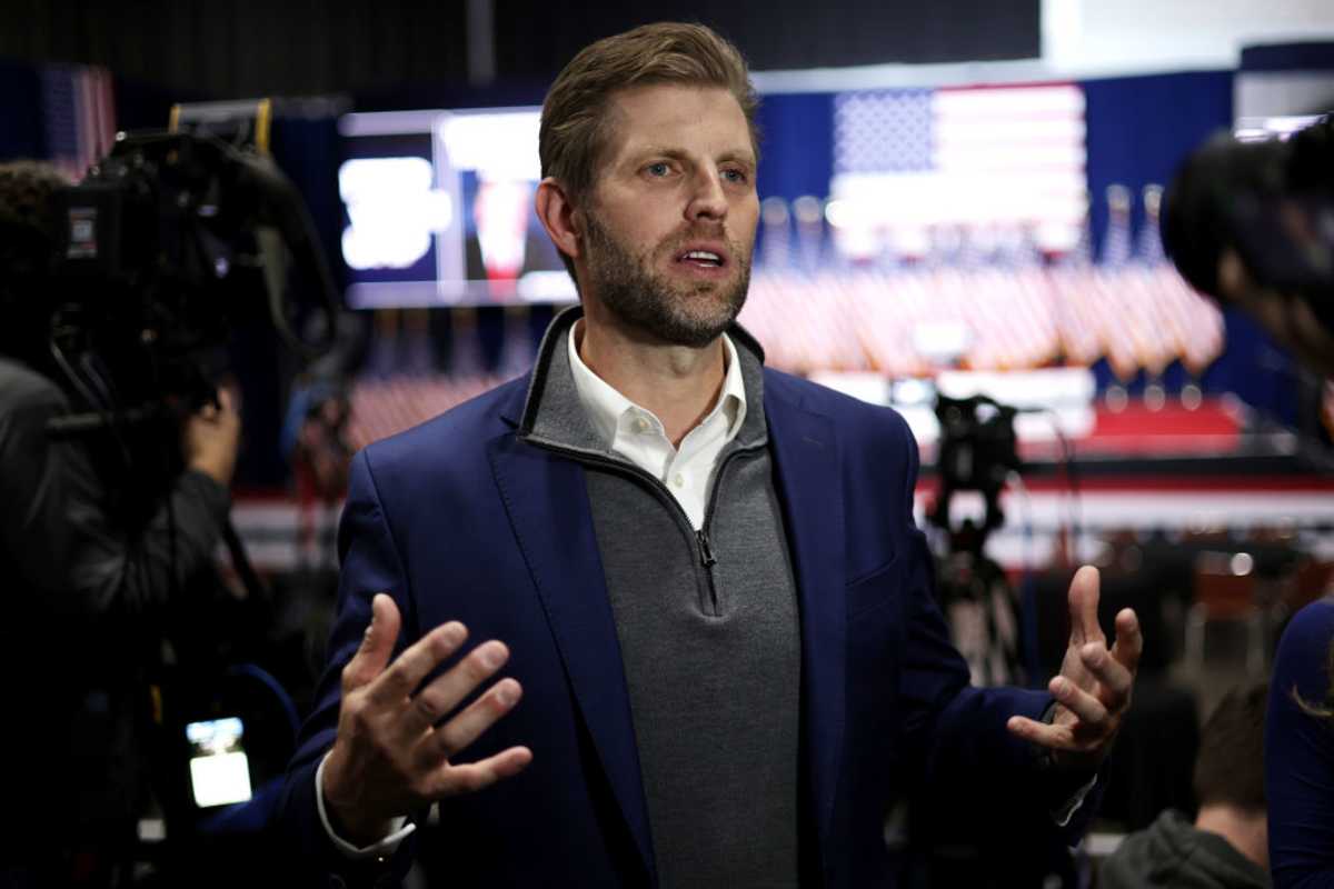 Donald Trump's son Eric Trump speaks to media before his father's caucus night event at the Iowa Events Center on January 15, 2024 in Des Moines, Iowa.(Image Source: Getty Images | Photo by Alex Wong)