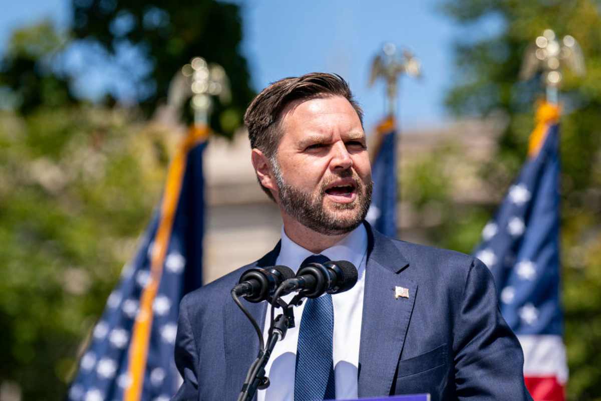 J.D. Vance addresses the audience at a campaign rally on Aug 20, 2024 in Wisconsin. (Image Source: Getty Images | Photo by Andy Manis)