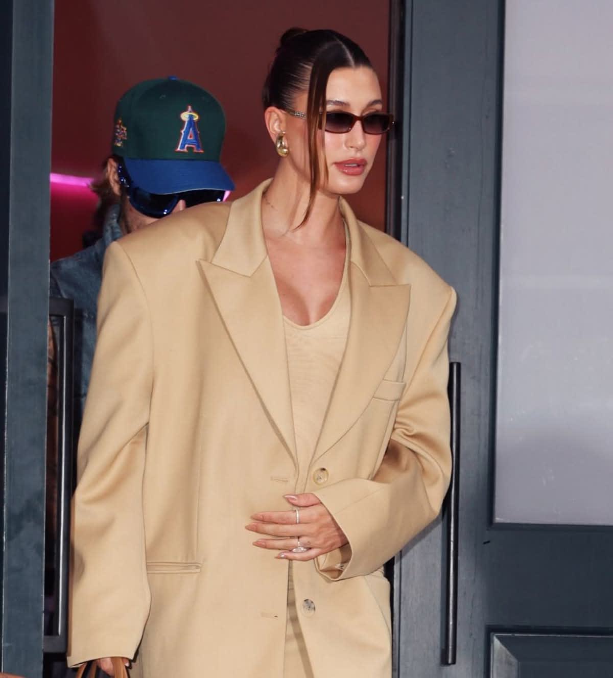 Hailey Bieber leaving her 'Rhode' pop up on June 23, 2024 in New York. (Image Source: MEGA/Getty Images)