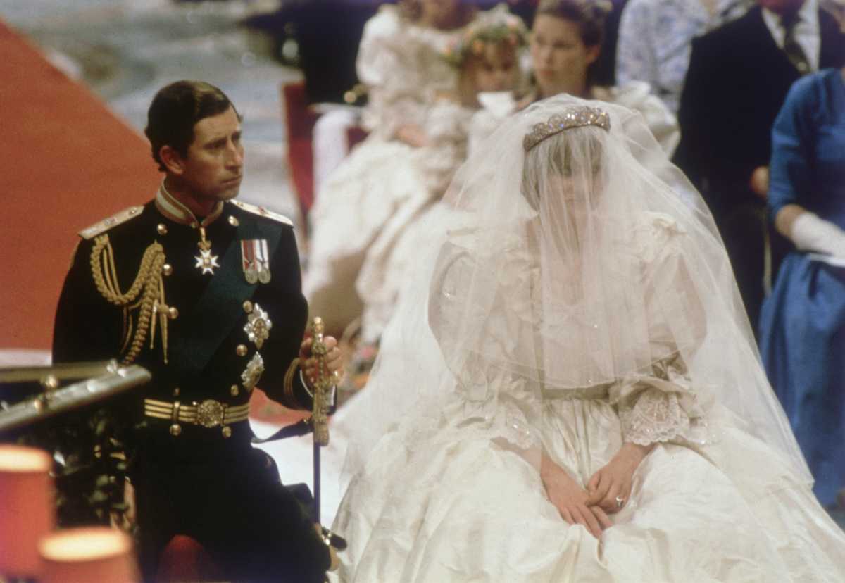 Charles, Prince of Wales, with his wife, Princess Diana (1961 - 1997), on the altar of St Paul's Cathedral during their marriage ceremony. (Image Source): Getty Images | Photo by Hulton Archive