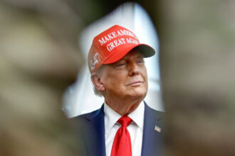 Donald Trump with a red MAGA hat