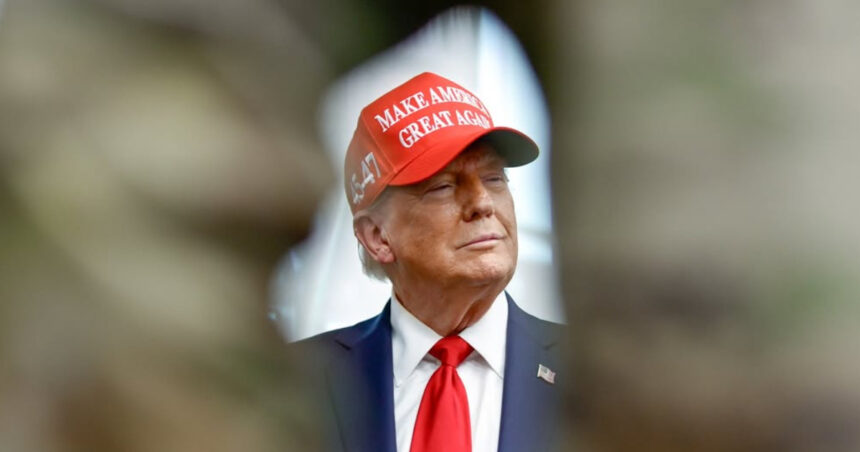 Donald Trump with a red MAGA hat