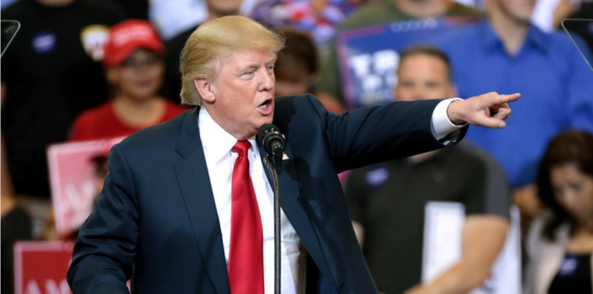 Donald Trump speaking with supporters at a campaign rally.