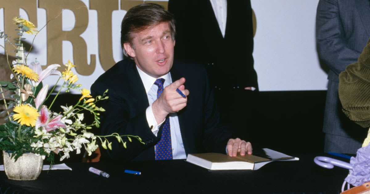 Donald Trump signing Art of the Deal copies in New York in 1988. (Cover Image Source: Getty Images| Photo by Rick Maiman)